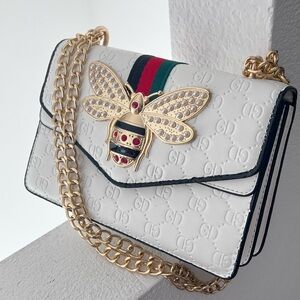 Elegant White Designer Bag with Gold Chain